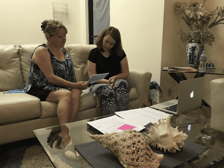 Members of the Cdesigns Marketing team discuss a project